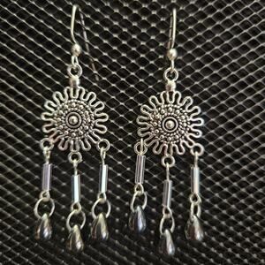 Antique silver sunburst, silver bugle and hematite teardrop earrings